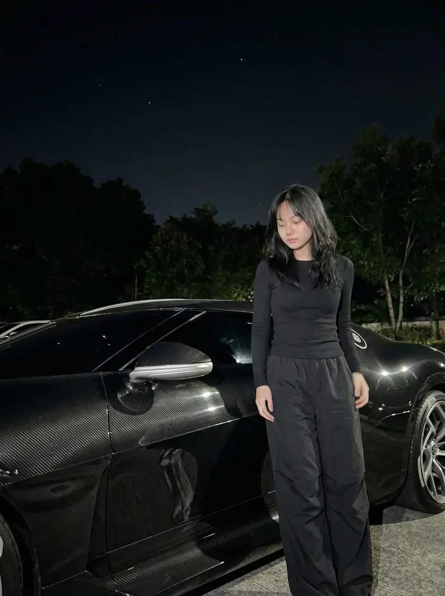 Nighttime Portrait with Luxury Car