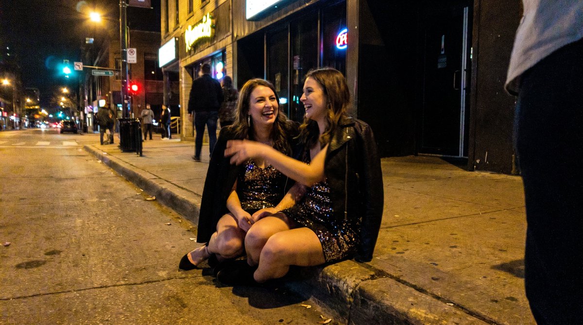 Candid Party Snapshot on Sidewalk